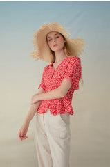 Short-Sleeve Linen Blouse With Ruffled Hem And Button-Front V-Neck Silhouette