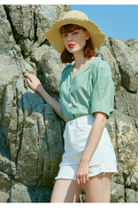 High-Rise Distressed Denim Shorts with Raw Hem for Women
