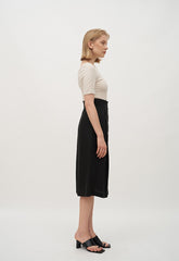 High-Waisted A-Line Linen Midi Skirt with Front Button Detail and Soft Pleat Accents