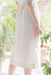High-Waisted Button-Front Linen Midi Skirt with Soft Drape and Side Slit Detail