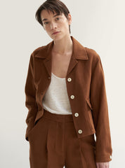 Cropped Button-Front Linen Blouse With Notched Collar and Flap Pocket Detail