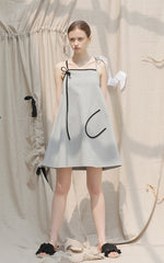 Asymmetrical One-Shoulder Linen Mini Dress with Statement Pocket and Modern Silhouette