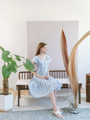 Feminine Pleated Midi Dress Crafted In Breathable Linen With Puff Sleeves And Tie-Back Waist