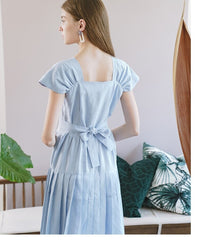 Feminine Pleated Midi Dress Crafted In Breathable Linen With Puff Sleeves And Tie-Back Waist