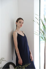 Elegant Sleeveless Midi Linen Dress with Side Ties and Lightweight Textured Finish